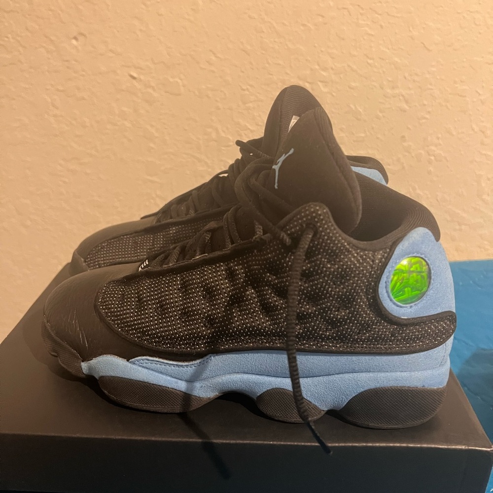 Condition: New worn once with box a bit messed up Comes with crease protectors